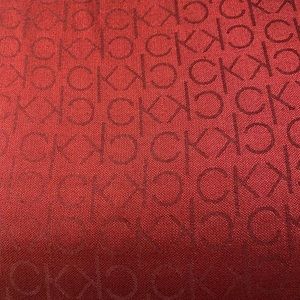 Calvein Klein silk like scarf/wrap NWT.  Burgundy/Martin color. 72"  x 26"